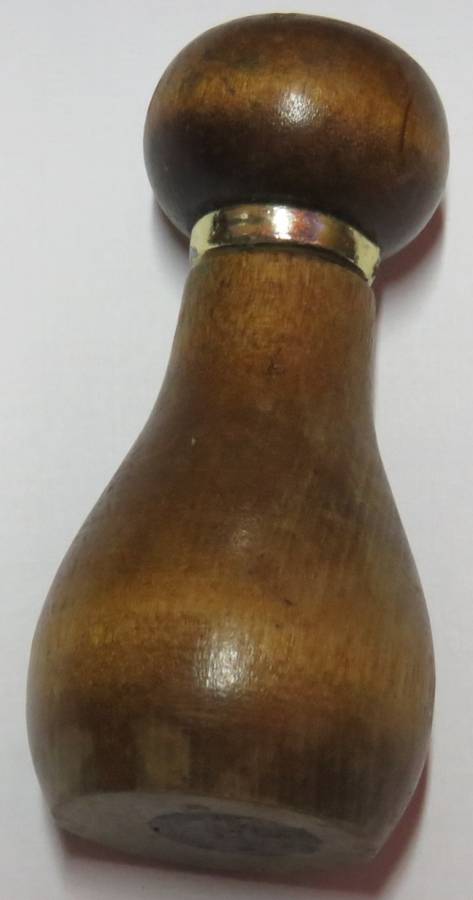 Vintage wooden bottle shape opener