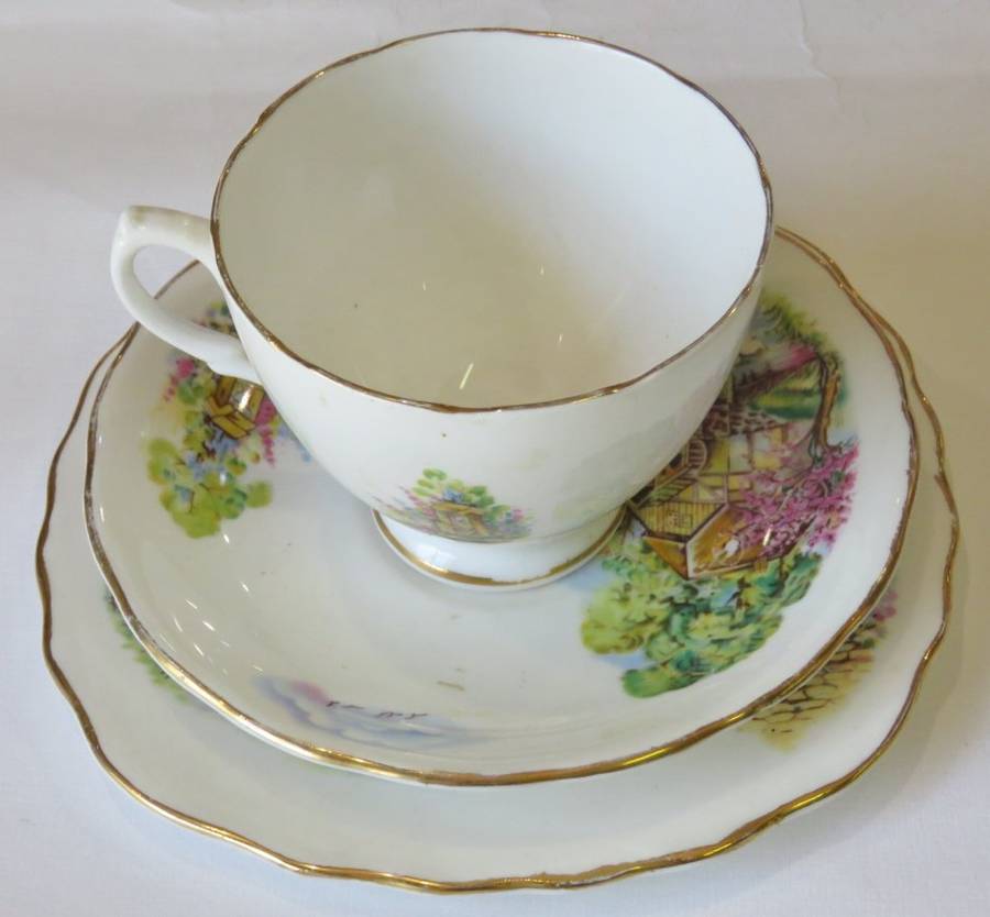 Crown Regent porcelain tea trio