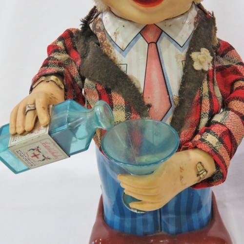 Vintage Tinplate Blushing Willy drinking man - Not working