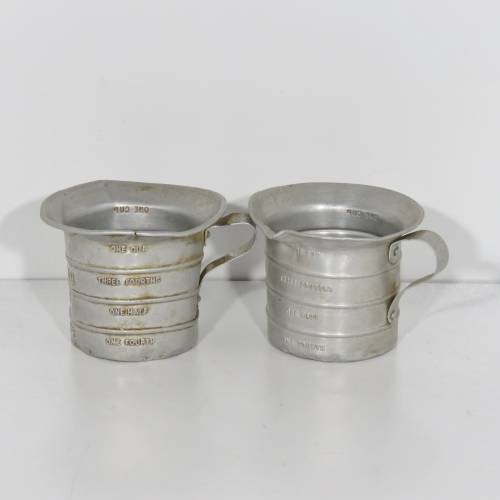 Pair of vintage Aluminium Royal measuring cups