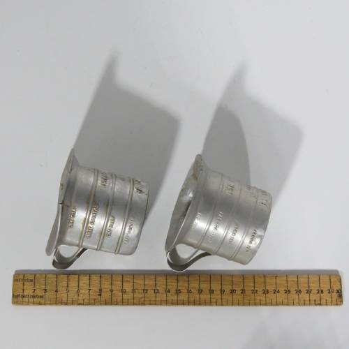 Pair of vintage Aluminium Royal measuring cups