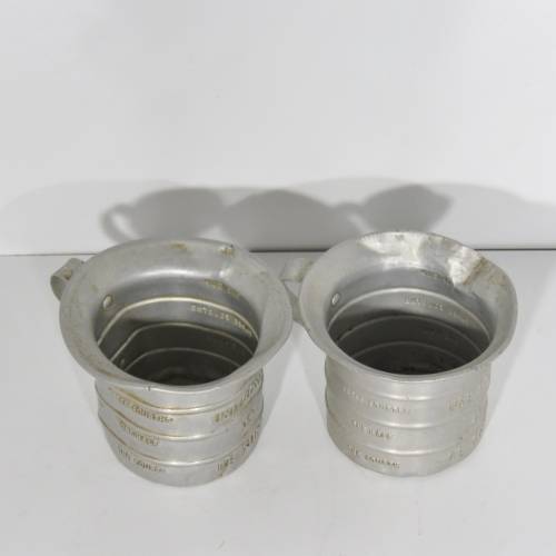 Pair of vintage Aluminium Royal measuring cups