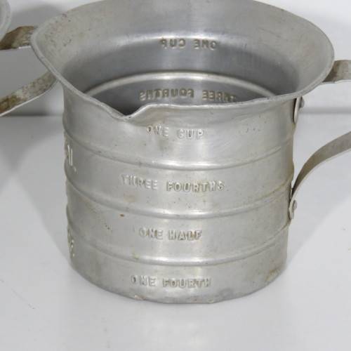 Pair of vintage Aluminium Royal measuring cups