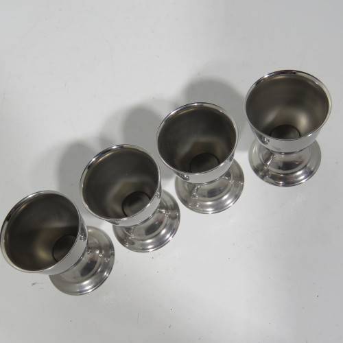 Set of 4 stainless steel egg cup holders