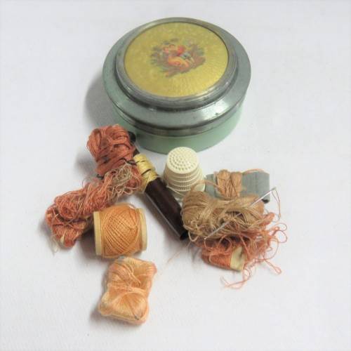 Vintage needlework tin with contents