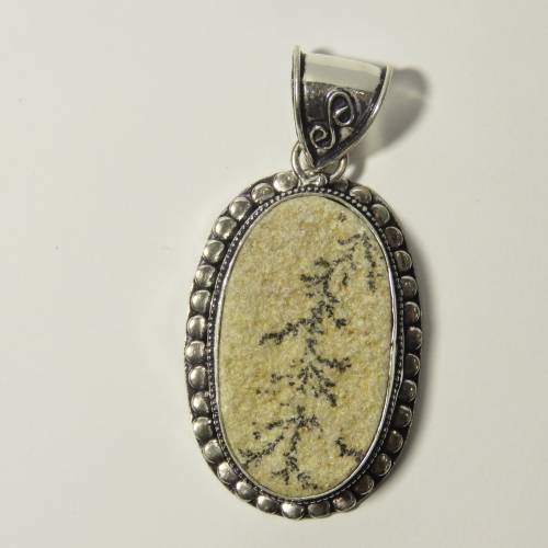 Sterling silver pendant with fossil inlay