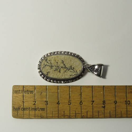 Sterling silver pendant with fossil inlay