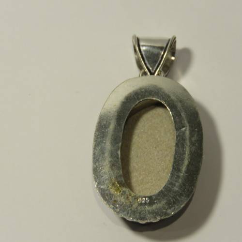 Sterling silver pendant with fossil inlay