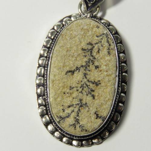 Sterling silver pendant with fossil inlay