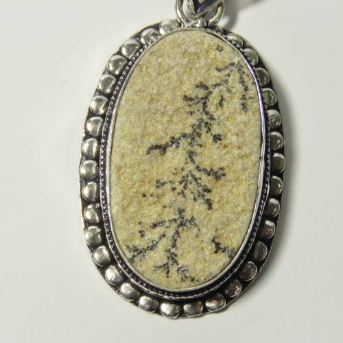 Sterling silver pendant with fossil inlay