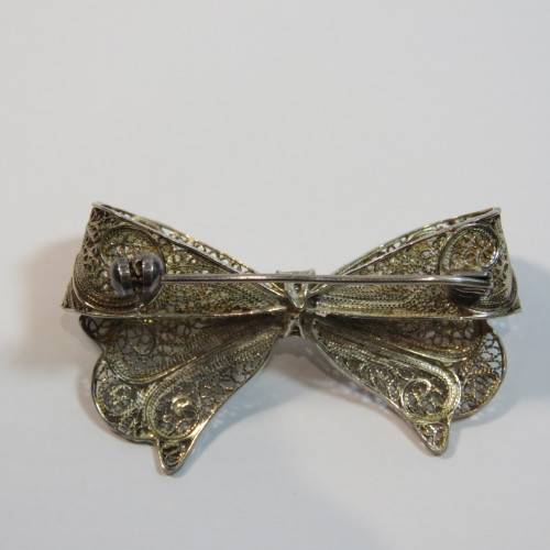 Silver coloured filigree brooch - Marked 925 on pin