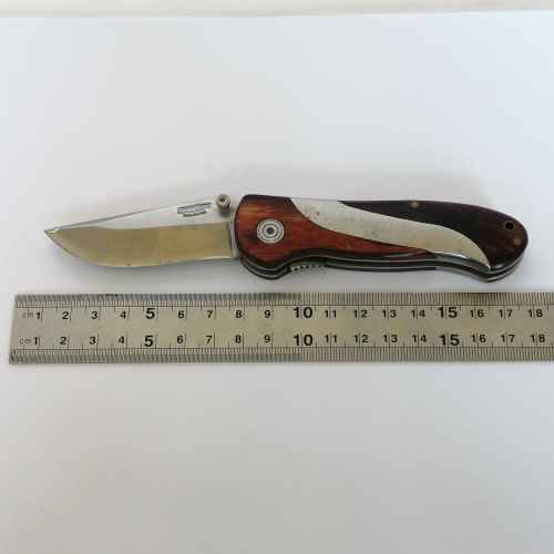Gortex pocket knife with wood and stainless steel handle