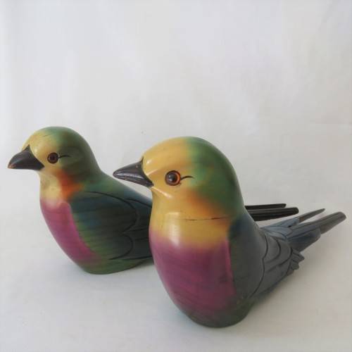 Pair of colorful wooden swallows