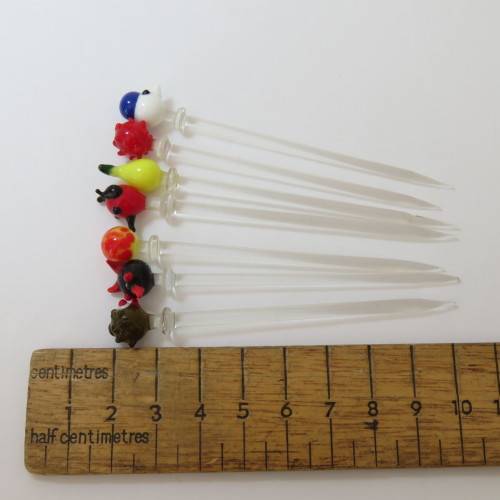 Lot of 7 vintage cocktail sticks of glass in small vase