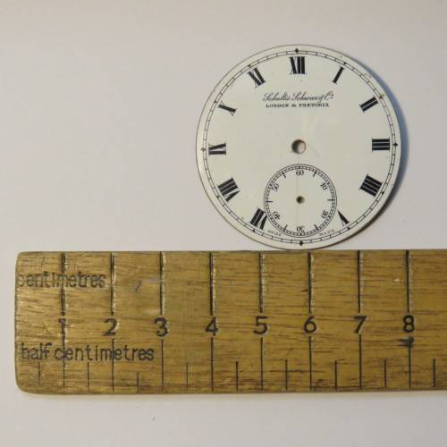 Schultis Schwar & Co London & Pretoria pocket watch enameled face - Fine crack but ok