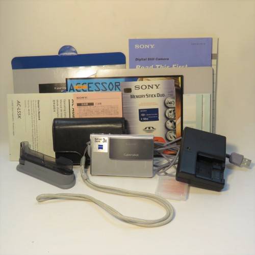 Sony DSC 17 digital still camera with books, stand, case, cables and 128 MB memory card