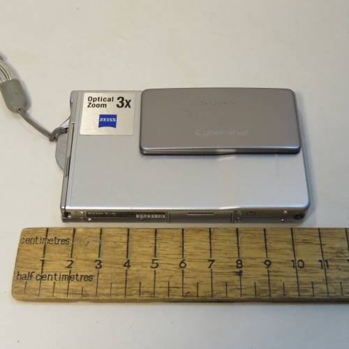 Sony DSC 17 digital still camera with books, stand, case, cables and 128 MB memory card