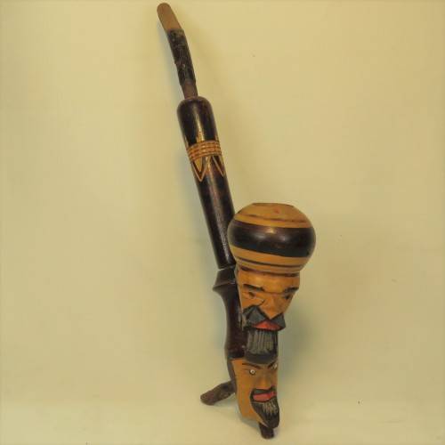 Vintage long stemmed pipe with 2 faces