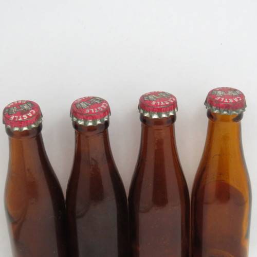 Lot of 4 vintage castle Beers miniature bottles - 2 with labels