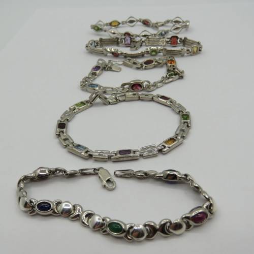 Lot of 5 silver look alike bracelets with colored stones - never used