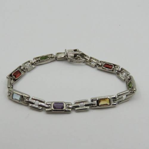 Lot of 5 silver look alike bracelets with colored stones - never used