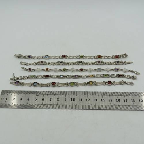 Lot of 5 silver look alike bracelets with colored stones - never used
