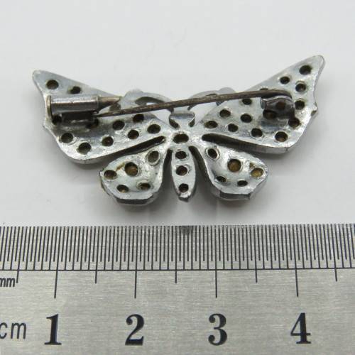 Vintage butterfly brooch with many stones