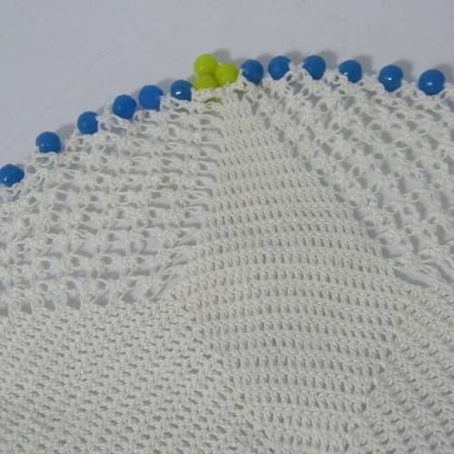 Old doily with blue and yellow beads handmade