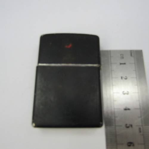 Zippo lighter with skull motif