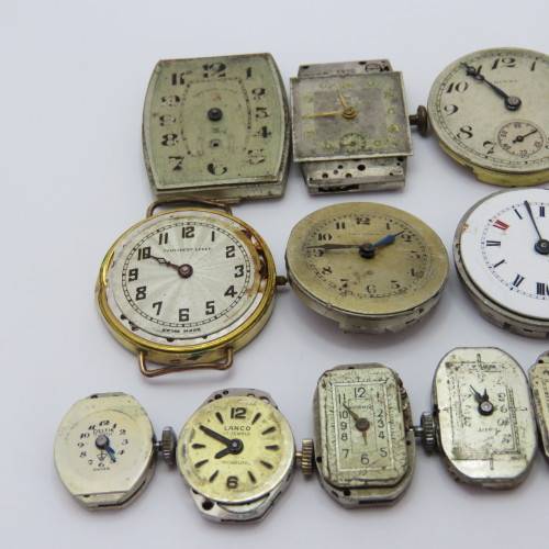 Lot of 14 mechanical watch movements for spares