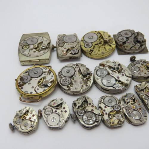 Lot of 14 mechanical watch movements for spares