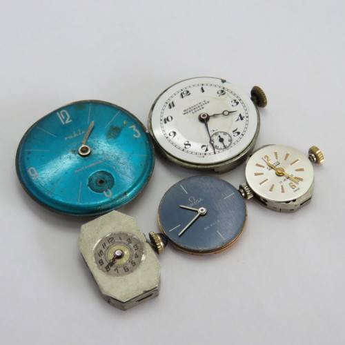 Lot of 5 mechanical watch movements for spares including Omega DeVille Caliber 620 - Not working