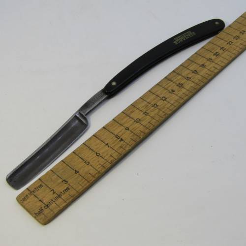 Bismarck vintage razor in well used box