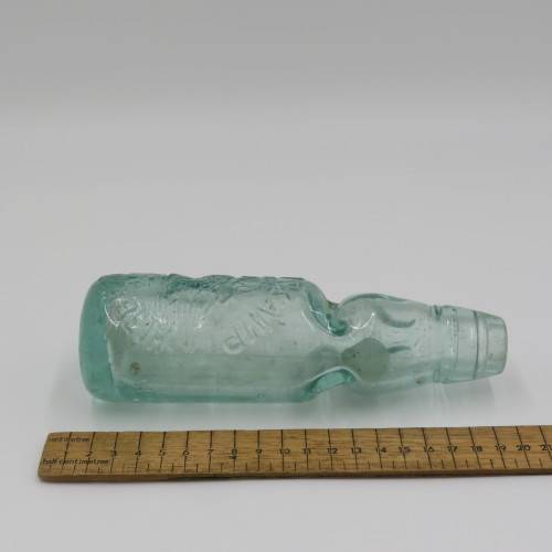 Vintage Heir Kamp Port Elizabeth glass bottle with marble
