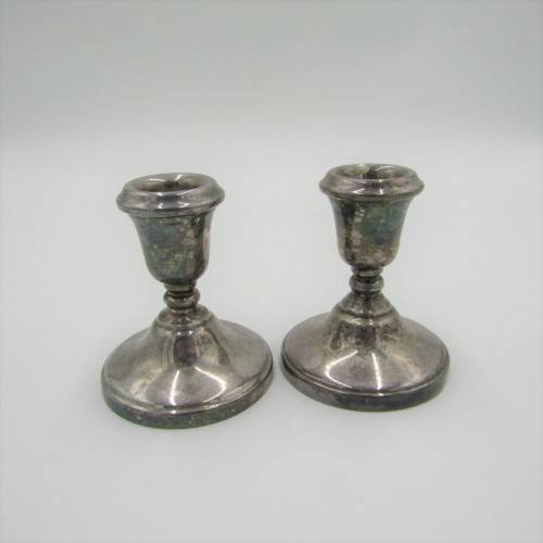 Pair of Lambidis original Silverware candle holders