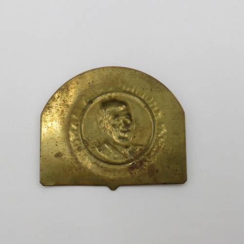 Small brass plate with Nelson Mandela unsure of origin