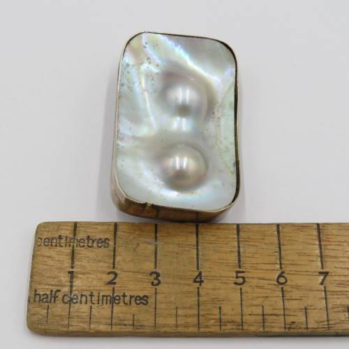 Sterling silver brooch with mother of pearl