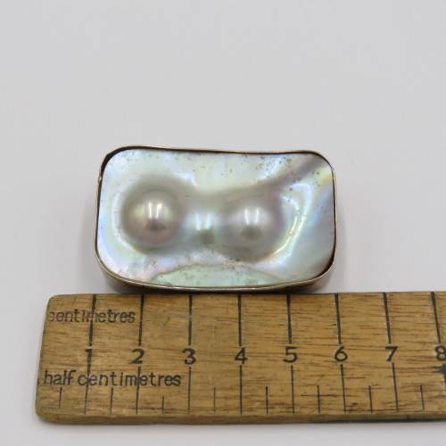 Sterling silver brooch with mother of pearl