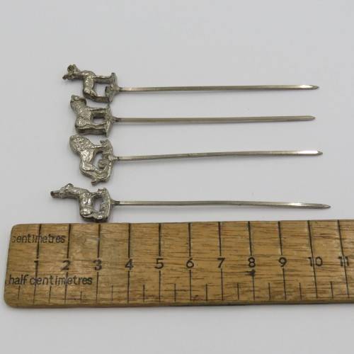 Set of 4 white metal cocktail sticks