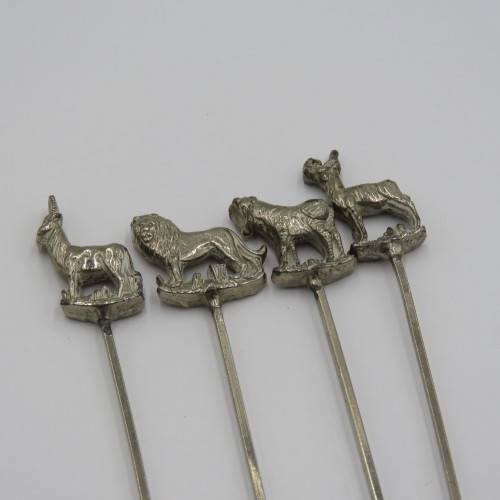 Set of 4 white metal cocktail sticks