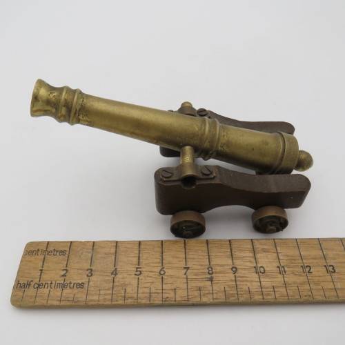 Vintage brass and wood cannon model