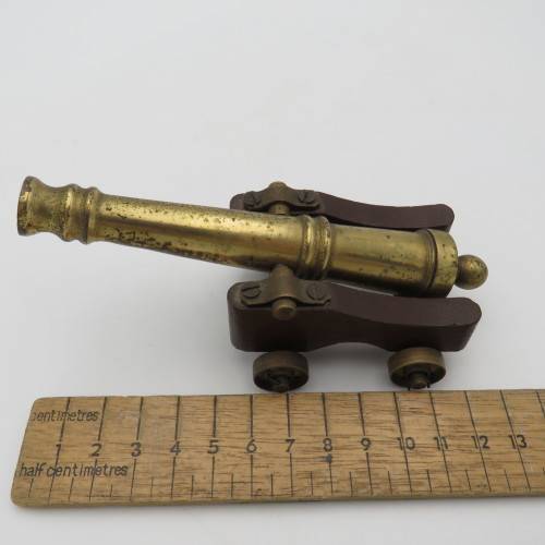 Vintage brass and wood cannon model