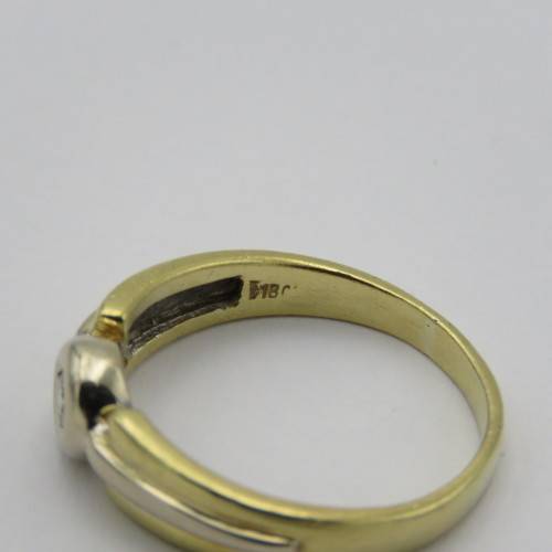18kt White and yellow gold diamond ring - appr. 0,15ct - Weighs 5,6 g - Size S