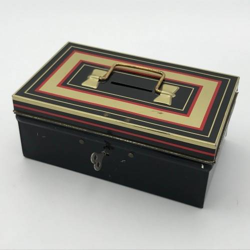 Vintage savings money box with key
