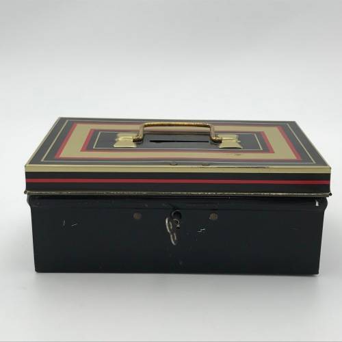 Vintage savings money box with key