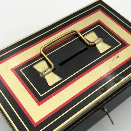 Vintage savings money box with key