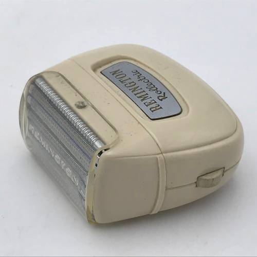 Vintage Remington Rollectric auto-home electric shaver