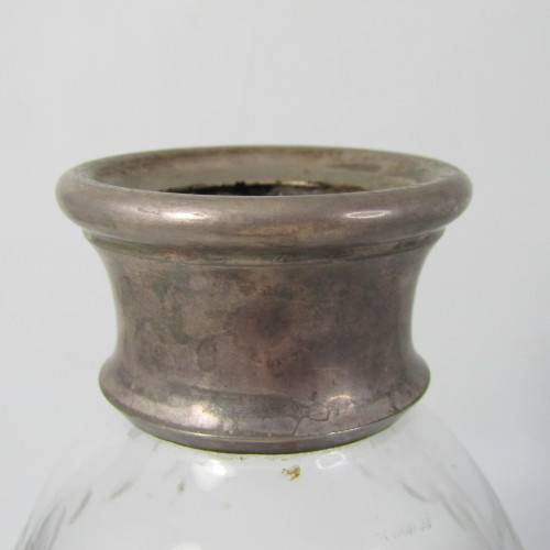 Beautiful vintage glass decanter with silver plated rim