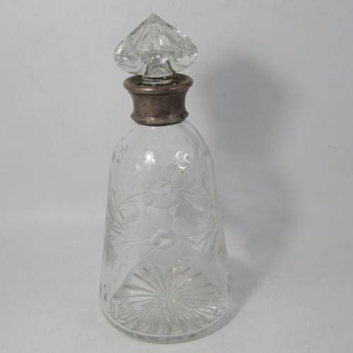 Beautiful vintage glass decanter with silver plated rim