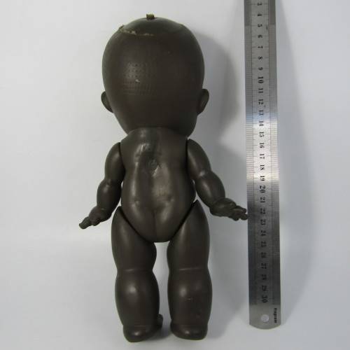 Pair of vintage African rubber dolls